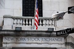 18-2 New York Stock Exchange And Wall St Signs In New York Financial District.jpg